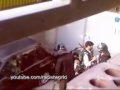 Basij Militias arresting two young protesters in Tehran, Iran