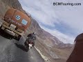 Here is a video of Dheeraj and me riding down from Baralacha La pass (16,500ft) on the Manali - Leh highway. Dheeraj is riding his Black Bajaj Pulsar 150 and I am riding my Red Bajaj Pulsar 180 and the video was shot by me through my Kodak cx7430 digital cam, mounted on my shoulder.For more videos and photographs of Ladakh and traveling in India, please visit our travel forum at http://www.bcmtouring.com/forum/