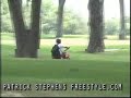 patrick stephens rides motorcycle on golf course , clubs thrown at him