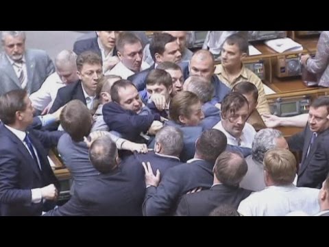 Brawl - A brawl broke out in Ukraine's parliament as ministers voted to approve a presidential decree to call up more military reserves. Report by Laurie Blake.