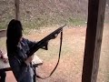Girlie shoots a mossberg 12 gauge pump