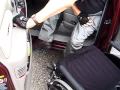 Quadriplegic transfers from wheelchair into minivan