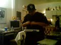 squareweezy of the fingerbangerz demonstrates his pact with the devil (standing in the background) by making his drum machine float in mid air.