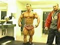 Lee Priest Posing in the Gym Bathroom