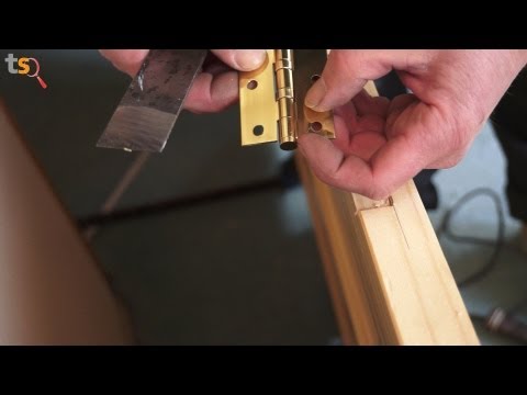 how to put hinges on a door