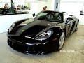 Silver Porsche Carrera GT and Black Porsche Carrera GT
