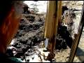How to Operate a Backhoe : How to Operate the Back Boom on a Backhoe