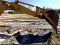 How to Operate a Backhoe : How to Operate the Back Boom on a Backhoe