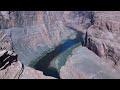 Recorded June 6, 2010. Horseshoe Bend is the name for a horseshoe-shaped meander of the Colorado River located near the town of Page, Arizona. It is located slightly downstream from the Glen Canyon Dam and Lake Powell within Glen Canyon National Recreation Area, about four miles south of Page. Accessible via a ¾-mile hike from US Route 89, it can be viewed from the steep cliff with a breathtaking 1000 foot drop. Also included at the end of the video is a scenic stretch of US89 south of Horseshoe Bend. From: timvp.com