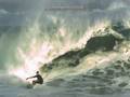 Big Slow Motion Wave with a surfer.