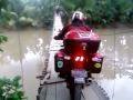 Red Devil PULSAR 200 on Hanging Bridge of Sawarna, West Java