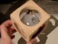 light bulb in solid wood cube