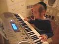 HASSIDIC KID PLAYING KEYBOARD 2
