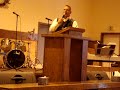 Sammy Preaching Under the Juniper tree