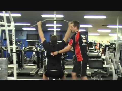 FITCollege - http://www.FitCollege.edu.au/ . Keagan, is one of FIT College Trainers and assessors and today he teaches you how to use the vertical pulling machine (Lat pu...