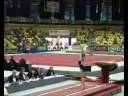 Young gymnasts doing amazing skills.