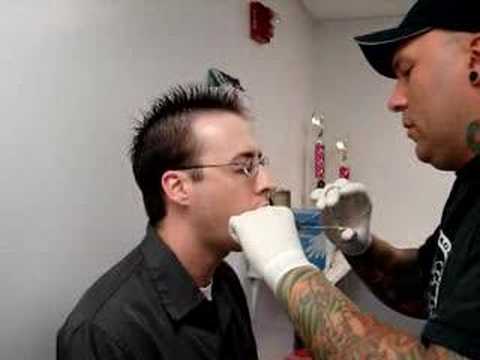 Jasin getting Labret pierced