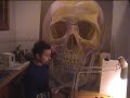 Nahem Shoa paints a portrait of a giant human skull