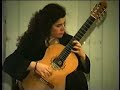 smaro gregoriadou interprets invocacion y danza by joaquin rodrigo, on a classic guitar with metalonylon trebles, featuring kertsopoulos aesthetics*. live concert in athens (parnassos concert hall, 31/1/98).
*kertsopoulos aesthetics: guitars, strings, acoustic applications of evolved specifications, a 30-year research on history and �sthetics of guitar, accomplished by greek guitarist-maker yorgos kertsopoulos and involving numerous suggestions on interpretation of old and new guitar repertoire, as well as transcriptions from other instruments to guitar. since �sthetics' first presentation in athens, 1994, by their inventor, numerous astonishing innovations have enriched inventive guitarist's sound, recreating 500-years of beautiful guitar tradition: high-pitched, transitive and re-entrant tunings up an octave higher than the ordinary, double and triple-course stringing, tone-colour's diversity, access to unexplored tonalities, pedal mechanisms! 
historic evidence: in 1948 andres segovia introduced the nylon string aesthetic of a.augustine. the classical and flamenco guitar enjoys this aesthetic for more than sixty years and guitarists of such a worldwide prestige such as julian bream, john williams, alirio diaz, abel carlevaro, dimitri fampas, gerasimos miliaresis, the romero family, c.parkening,  a.lagoya, i.presti, l.almeida, evangelos & liza, c.kotsiolis, roberto aussel, r.dyens, paul galbraith, paco de lucia, p.pena, c.montoya, sabicas, serranito (just to mention a few of these astonishing performers), play with great success the segovia-augustine aesthetic which has total acceptance today. now, a.barrios and h.villa-lobos played with metal strings while d.prat, a.lauro, f.tarrega, r.montoya played with gut strings. at the time of m.giuliani, m.carcassi, l.legnani, f.carulli, f.sor, d.aguado the guitar was strung with metal, gut and silk strings and had either double courses or single strings. also further back in history g.sanz, bermudo, brescianello played the guitar in higher pitched tunings and the triple strung guitarra battente was popular mainly in italy. y.kertsopoulos introduced in 1994 the kertsopoulos aesthetics which as a multiplex open architecture scheme provide the possibility of reviving and realizing the many aspects of guitar's aesthetics, as they have been recorded in history. among many guitarists that play the aesthetics today, smaro gregoriadou has made many succesful first world presentations of different aspects of aesthetic styles in guitar interpretation.