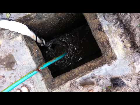 how to drain septic tank