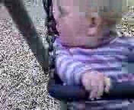 Harriet Thomas on a swing