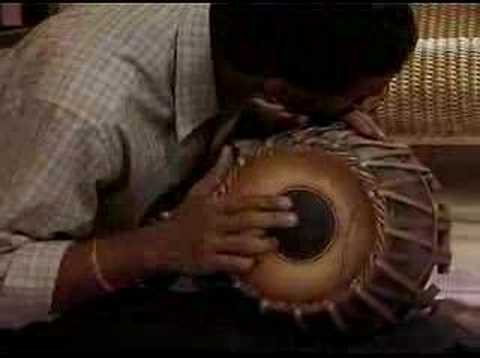 jugalbandhi - Virtuosity of Mridangam & Tabla. Greats Indian percussionists. Put yours headphones and Listen this.