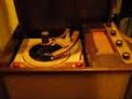 45 rpm vintage record and player
a happy pair - the ames brothers - orq directed bye glen osser