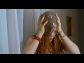 Girl blows up condom on her head from film