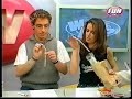david stone avec la chanteuse fran�aise sofia mestari sur une �mission en direct avec le magicien stephane vanel et elsa fayer. stone a eu un accident peu de temps auparavant car il est en b�quilles..

david stone with french singer sofia mestari during a live show. he seems hurt using crutches.