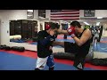 Utah State Representative for the Thai Boxing Association of the USA, Khuen Khru Will Bernales demonstrates a series of counters and escapes for when the Thai Round Kick is caught by your opponent.