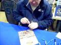 2008-12-26 | Dave Niehaus signing autographs ~> Seattle Mariners announcer and Hall Of Fame member Dave Niehaus signs ... (01:15)