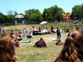 at the tennessee renaissance festival, a noble fop and...i forget who the other man was, face off in a sword duel~