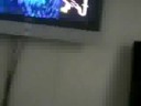A werid person playing mario karts on wii and She also can't do the WORM! How Sad!