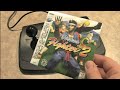 Watch in High Definition! Classic Game Room HD reviews the VIRTUA STICK for the Sega Saturn video game console. This is a virtua arcade fighter stick for fighting games like Virtua Fighter, Mortal Kombat, Street Fighter 2 and Battle Monsters. It has buttons making combos and combo moves easier and more arcade like. The Virtua Stick was a special arcade style joystick controller for the Sega Saturn meant to play Virtua Fighter and other games for the Saturn. It has 8 arcade style buttons, an ...