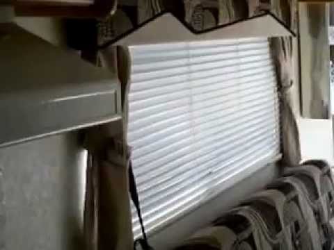 2003 Coyote KZ toy hauler hybrid travel trailer at Bullyan RV in Duluth, MN