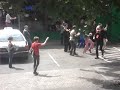 Line dancers in a parking lot