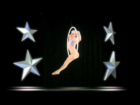 holographic animation - An aerial hoop performance filmed as a hologram with 3D star backing dancers. Aerial performance by Empress Stah. Animation by VjNeMo. Particle system by Jon...