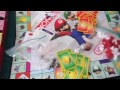 here is another video game merchandise review and it is the nintendo collector's edition of monopoly. this edition i'd say is my favorite monopoly game because it is the nintendo edition and i love everything that is nintendo related so i can review it and show you. also i will be showing you in detail about the game board, the cards, and the game pieces of the video game art inside the box.