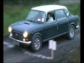 Ken Green takes his Morris 1800 on the MCC Centenary in the pouring rain in June 2002. Plus la change.