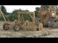 moleplough twin leg pulled by 310hp D8k  24\" deep with 4\" expanders