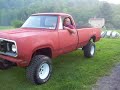 this my 1977 dodge w200 m880. thats my dad sitin in it revin it up. its got headers and purple horny glass packs it sounds pretty good. mopar or no car