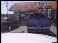 Guy steals a police car in front of cops
