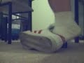 Under the table (wearing socks)