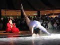 surrealist santa claus in egypt with contorsionist