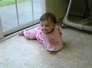 Kylie scooting along... Backwards!