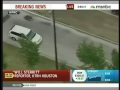 a driver in a white van led houston police on a high-speed chase for nearly an hour through two counties. monday, july 6, 2009. ... chase high speed police cops van car vehicle suspect arrest intersection road street city downtown county houston texas 2009 