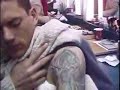 watch them apply the tattoo to his arm