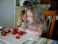 Ava prepares strawberries