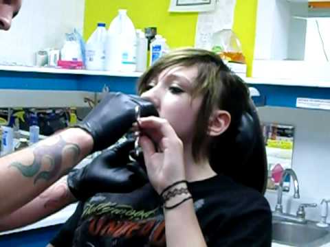 getting my spiderbites, the 2nd piercing. this guy was WAYYY more 