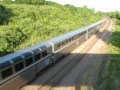 California Zephyr passes under bridge